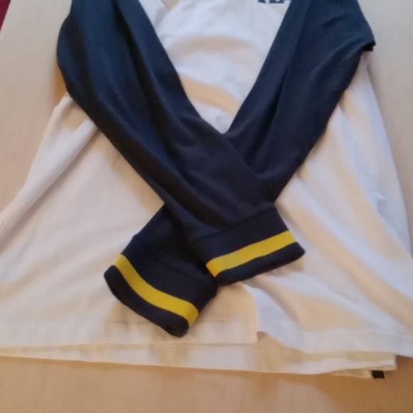 Long sleeve Polo by Karl Kani..size large. White with red, yellow and navy blue. - Picture 8 of 8